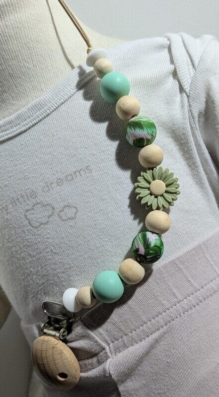 Attache tétine, fleur & vert