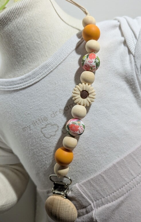 Attache tétine, fleur