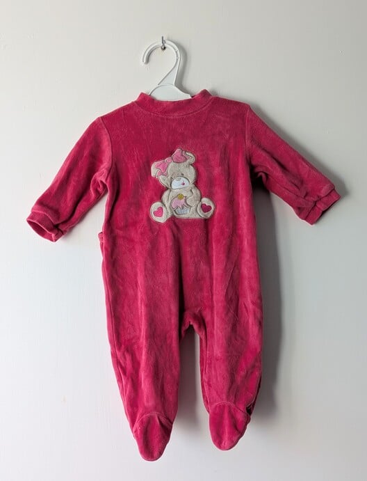 Pyjama rose motif ours, Influx