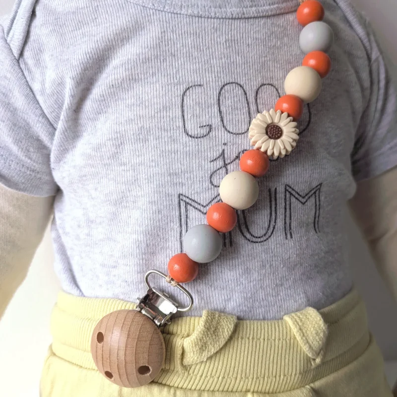 Attache Doudou, orange & fleur