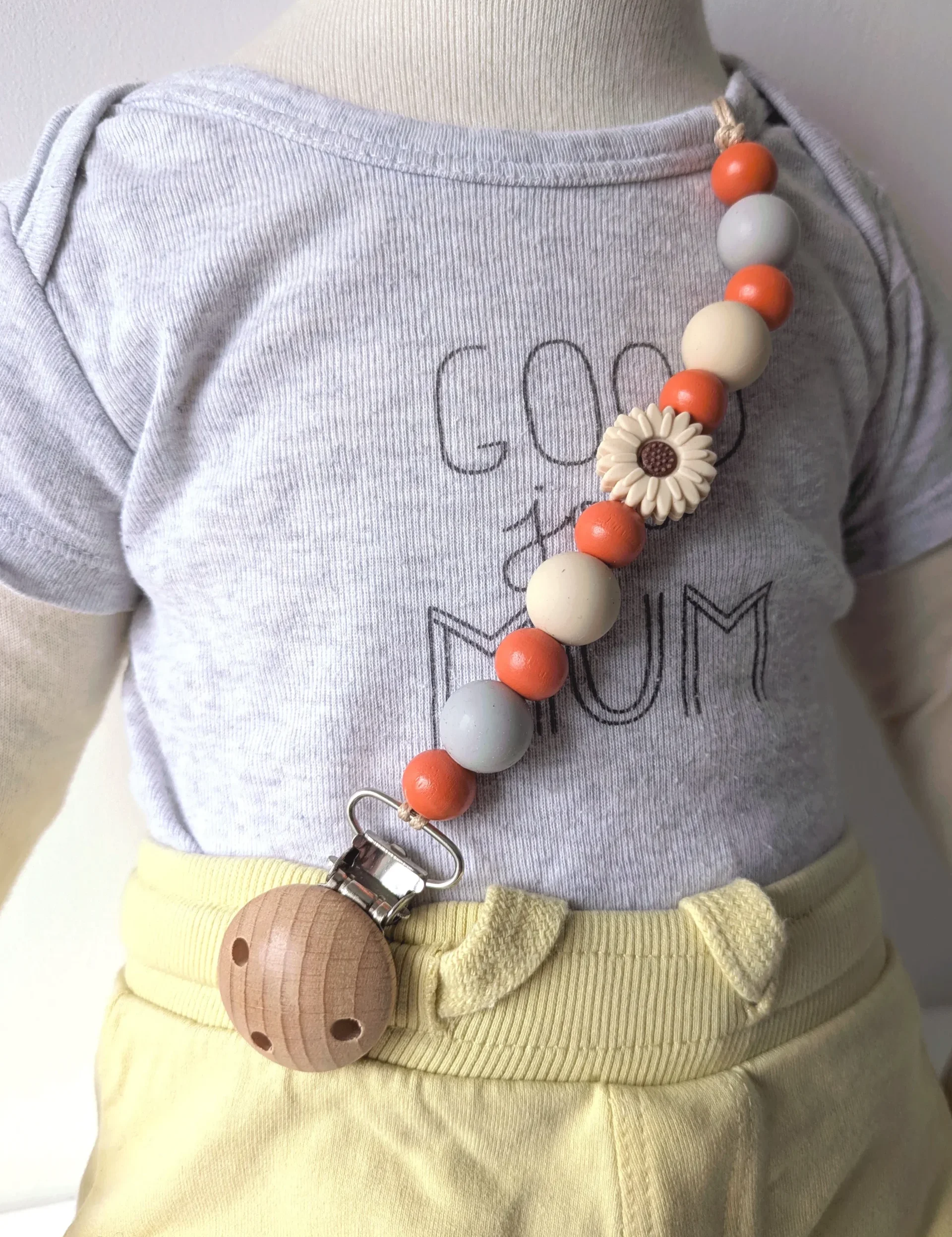 Attache Doudou, orange & fleur