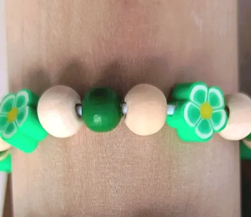 Bracelet élastique fleurs , taille 3-5 ans