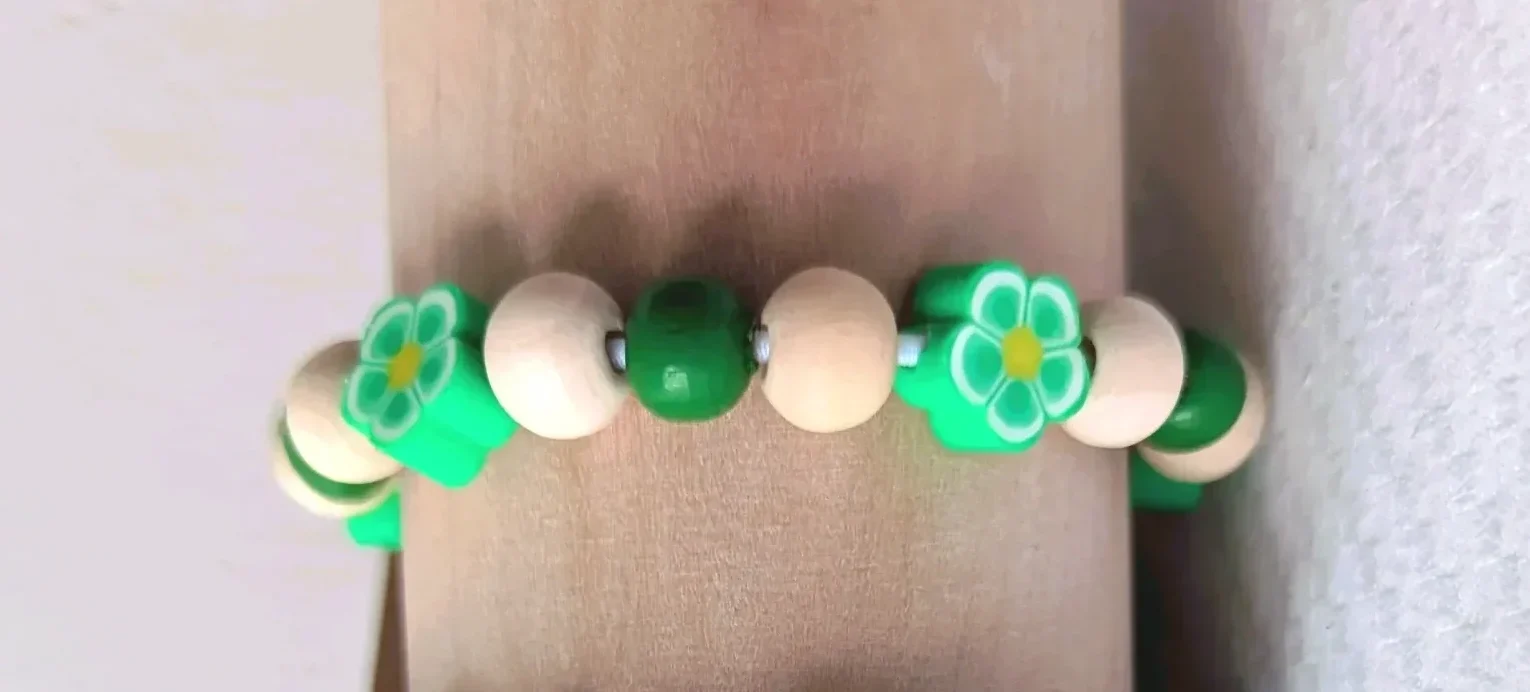 Bracelet élastique fleurs , taille 3-5 ans