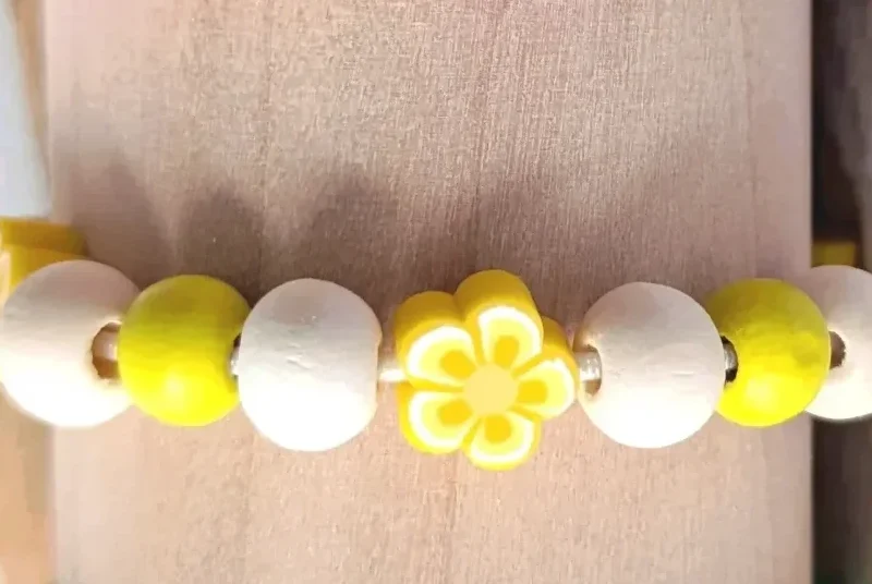 Bracelet élastique fleurs , taille 3-5 ans
