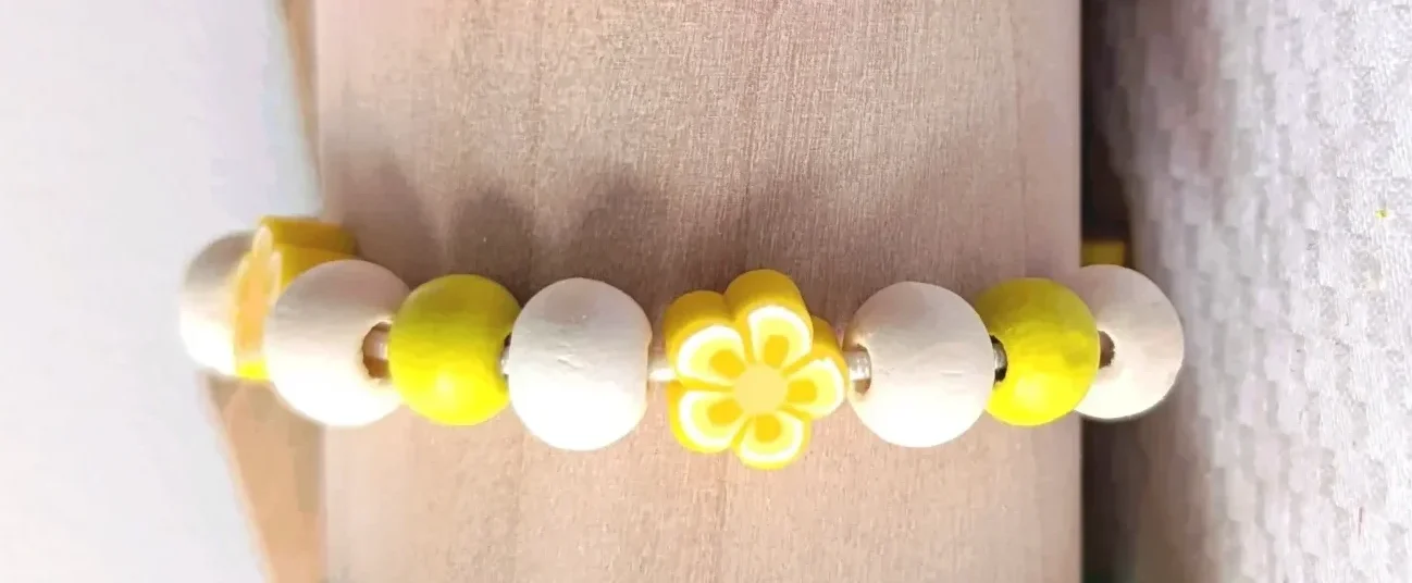 Bracelet élastique fleurs , taille 3-5 ans